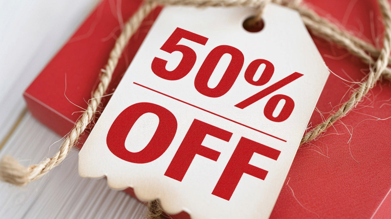 "50% Off Sale Tag on Red Gift Box for Unbeatable Deals and Savings"