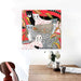 Vibrant abstract leopard canvas art print hanging above a modern dining area, showcasing colorful wildlife-inspired decor.