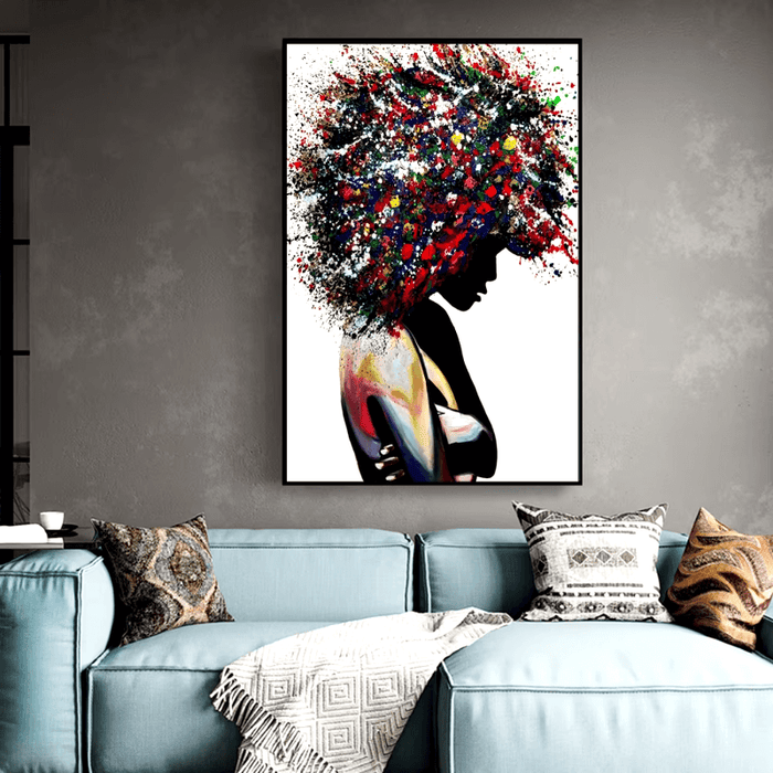 Vibrant colorful afro abstract canvas art in a modern living room setting, featuring silhouetted woman with dynamic colors.