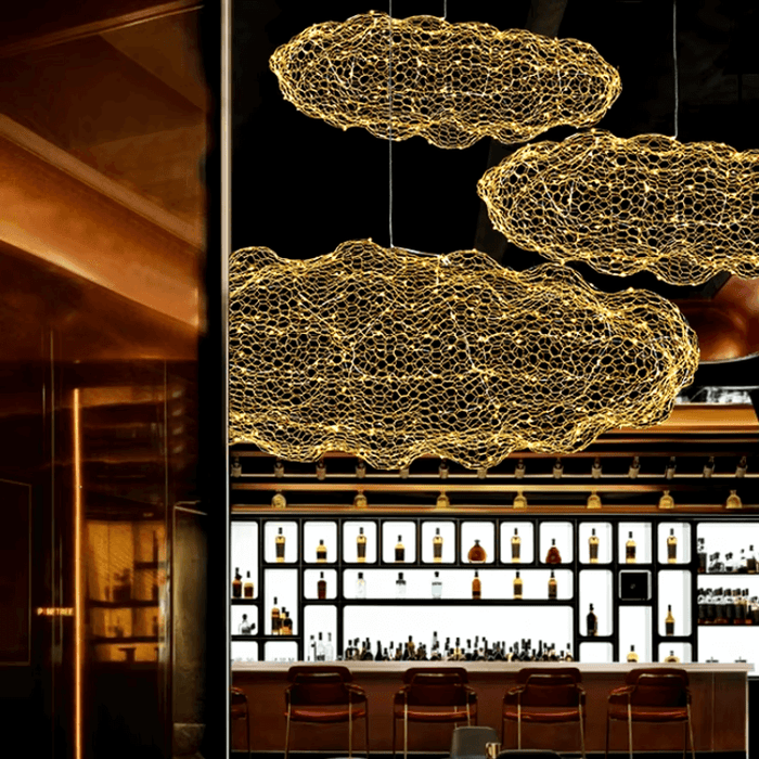 Cloud-Inspired Iron Net Chandelier illuminating a modern bar setting with warm, diffused LED lighting for an inviting atmosphere.