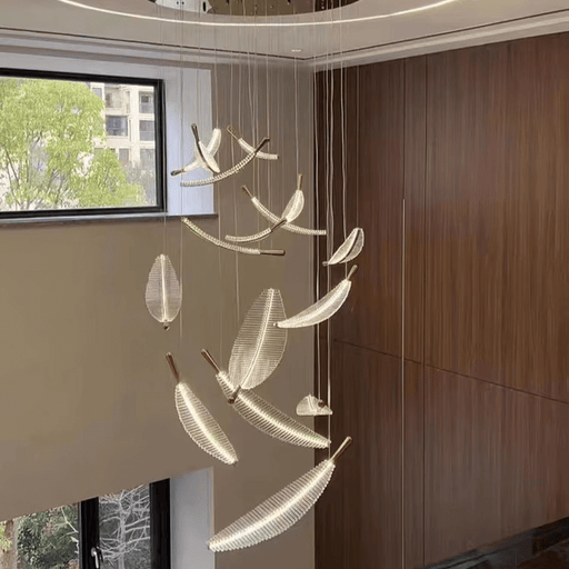 Modern Feather LED Chandelier in living room, featuring luxurious design with energy-efficient LED lighting and adjustable ambiance.