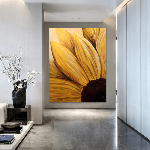 Sunflower Glow Oil Canvas Art hanging in a modern room, showcasing vibrant yellow petals and bold textures.