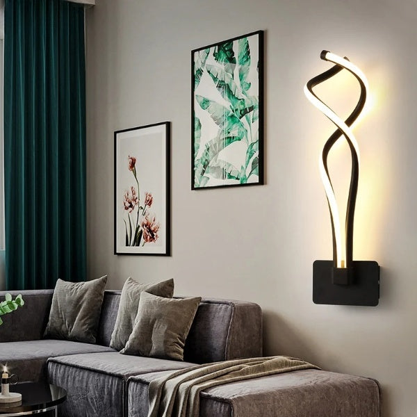 Modern artistic wall lamp with LED lighting, featuring a sleek design on a stylish wood finish background in a cozy living room setting.