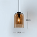 Minimalist Nordic glass pendant light, 15cm diameter, 22cm height, with E14 LED bulb for modern home decor.