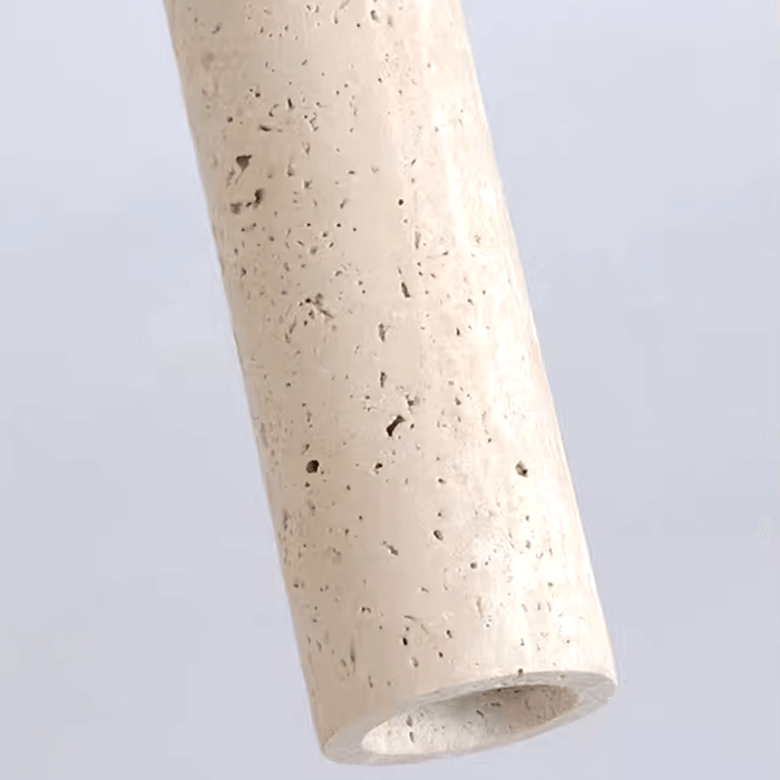 Natural stone cylinder ceiling light close-up showcasing elegant design and texture for home interiors.