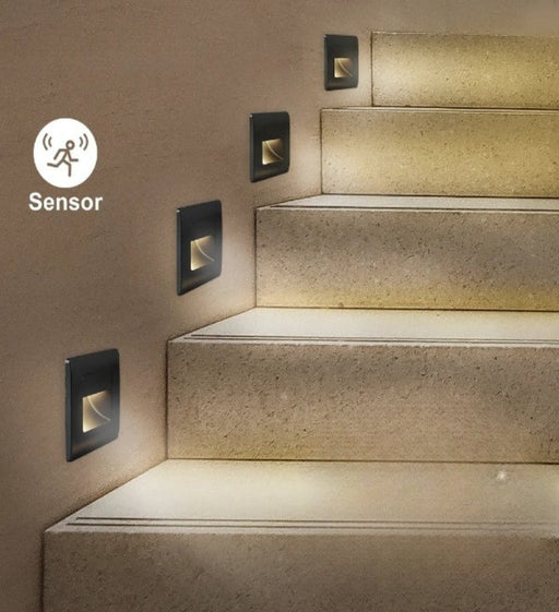 Recessed LED wall lights with motion sensor installed on stairs for automatic illumination