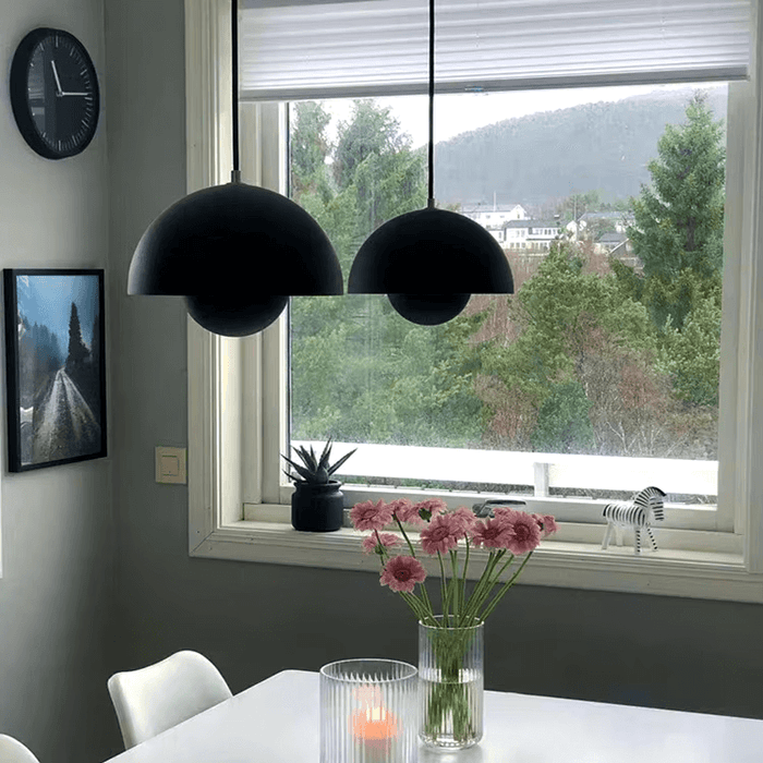 Modern kitchen with Danish Flower Bud Pendant Lights and scenic window view