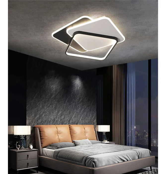 Modern overlapped LED ceiling light illuminating a stylish bedroom, providing efficient and bright lighting.