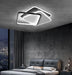 Modern Overlapped LED Ceiling Light illuminating stylish bedroom with city view