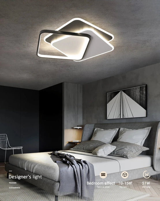 Modern overlapped LED ceiling light illuminating a stylish bedroom with elegant decor.