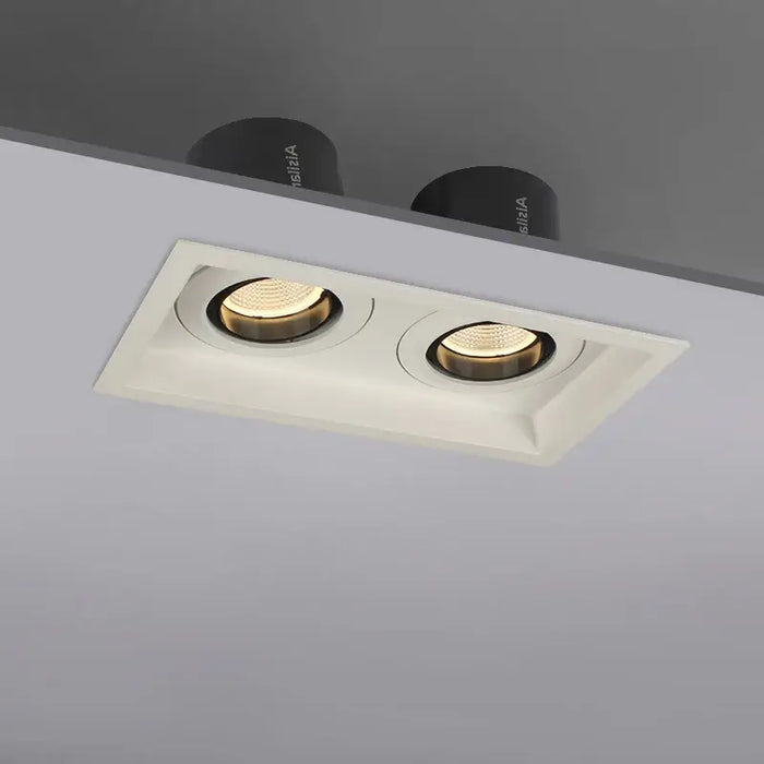 Narrow border LED recessed downlight with dual square spotlights in ceiling, ideal for modern home or commercial interior design.