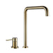 Elegant brass mixer tap with 360-degree swivel spout and single-handle design for kitchen.