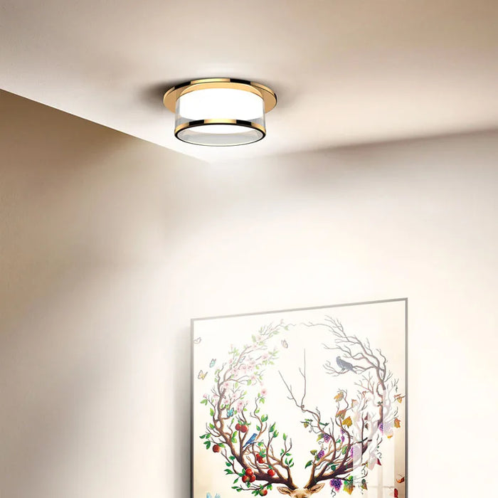 Crystal Ceiling Downlight Lamp illuminating a room with a modern art piece, highlighting sleek design and energy efficiency.