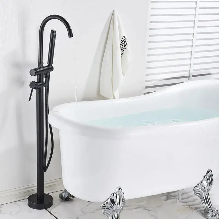 modern swivel spout freestanding bath mixer with white bathtub in elegant bathroom setting