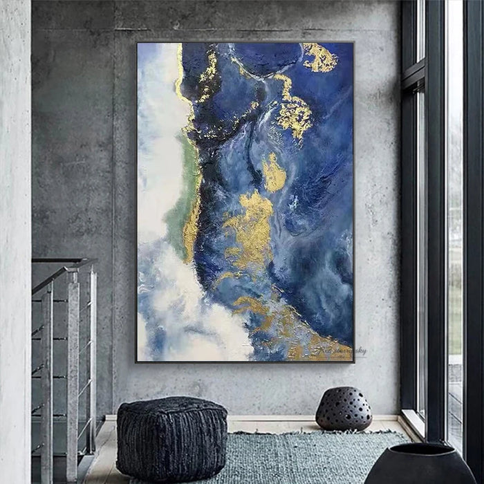 Abstract blue ocean oil painting on linen canvas, unframed, hung in modern living space with gray concrete walls and large window.