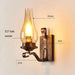 Retro industrial iron wall lamp with stained-glass shade and E27 bulb socket, vintage-style lighting fixture for home or business.