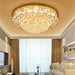 Luxury round crystal chandelier in elegant living room, featuring premium crystal and iron with plated finish.