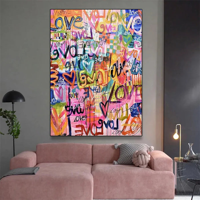 Love Graffiti Art Canvas with vibrant pink hues in a modern living room setting, featuring abstract design and stylish decor.