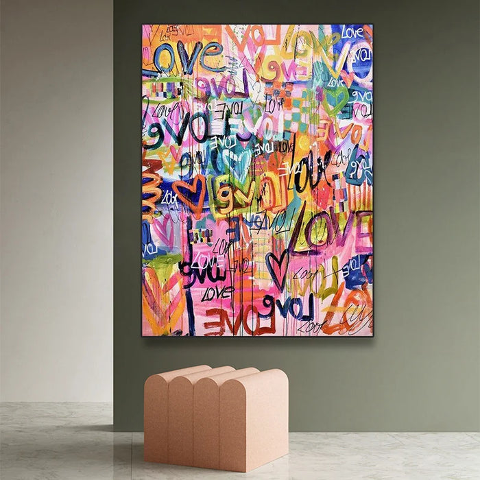 Vibrant pink graffiti art canvas with abstract love-themed design, perfect for modern interiors and stylish living spaces.