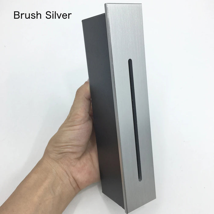 Brush Silver outdoor indoor wall lamp with advanced 3W LED technology held in hand, perfect for walkways and stairways.