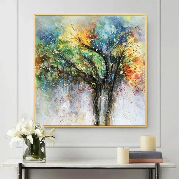 Abstract oil painting "Tree of Madness" with vibrant colors and bold brushstrokes on a high-quality canvas displayed above a table