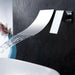 Wall-mount waterfall basin faucet in polished chrome, featuring modern design and wide spout for a soothing water flow.