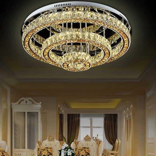 Luxury Modern Crystal LED Chandelier with elegant round ceiling design, enhancing a sophisticated dining room setting.