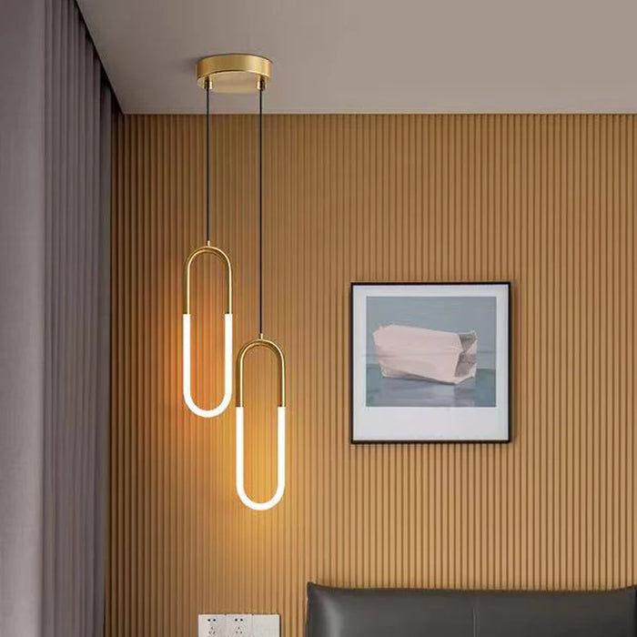 Minimalist U-Shaped LED Bar Chandelier in polished chrome, ideal for modern interiors, shown in a stylish room setting.