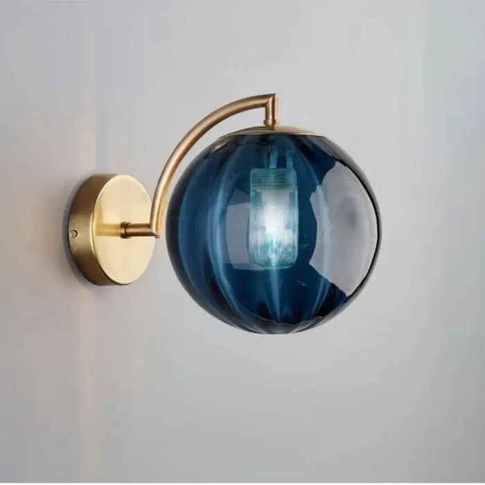 Nordic Glass Ball Wall Lamp with sleek gold mount, featuring a modern design and elegant blue glass shade for stylish home lighting.