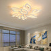 Modern flower petals ceiling light illuminating a stylish living room with contemporary wall art and large windows.