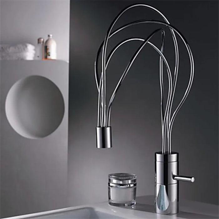 Modern LED deck-mount basin faucet with artistic flow pattern in a contemporary bathroom setting