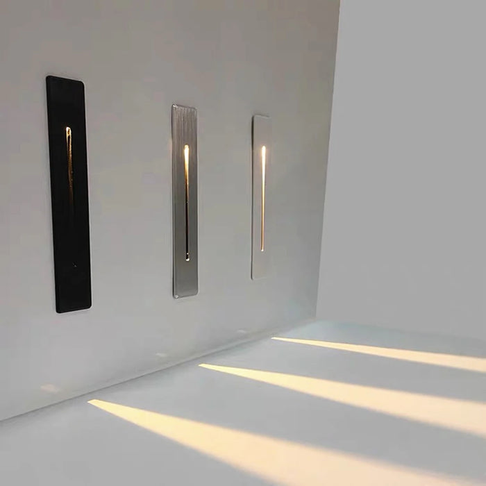 Modern outdoor indoor wall lamps with LED lighting for walkways and stairways, available in black and metallic finishes.