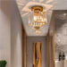 Crystal ceiling lampshade in a modern hallway, featuring polished finish and CCC, CE safety certifications. Suitable for dining rooms and foyers.