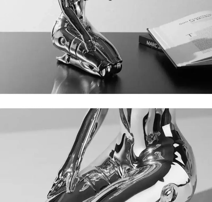 Mechanical Goddess Modern Sculpture with electroplated finish showcasing futuristic design on a black surface.