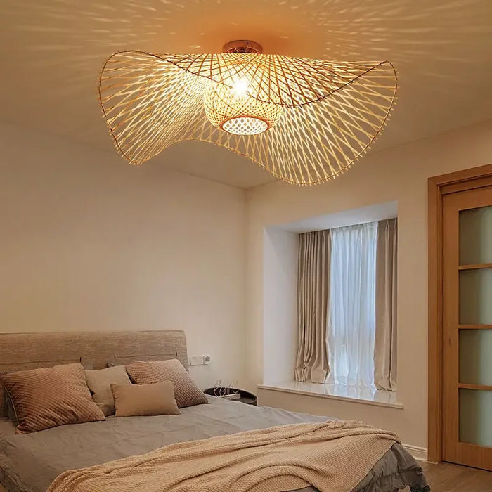 Japanese Bamboo Pendant Lamp in bedroom, featuring elegant curved design and warm LED lighting. Perfect for living room or dining room.