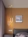 Minimalist U-Shaped Bar Chandelier in modern bedroom, polished chrome finish, white LED light, ideal for parlor or study.