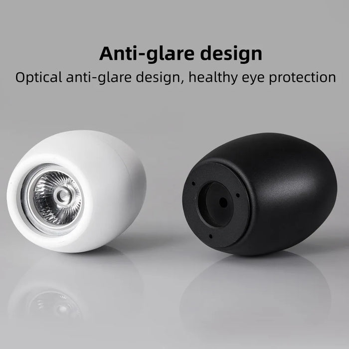 Black and white anti-glare LED downlights for eye protection on a gray background.