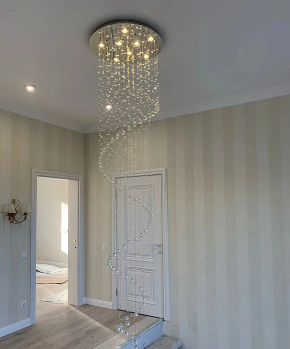 Modern K9 Crystal Luxury Chandelier with dazzling spiral design in an elegant room setting, showcasing LED lighting brilliance.