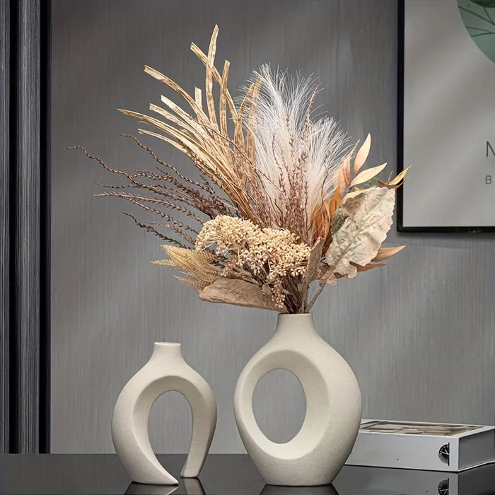 Nordic Boho Ceramic Vase Set with dried flowers on a dark tabletop, showcasing minimalist modern design.