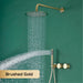 Luxury brass concealed shower system with dual handle control and polished brass finish shown in a brushed gold color on a green wall.