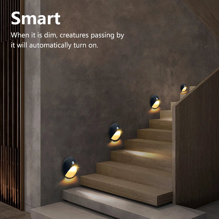 Recessed LED motion sensor wall lamps illuminate stairs in low light with smart activation for safety and convenience.