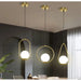 Modern cage chandelier with three LED pendant lights in a stylish dining room setting