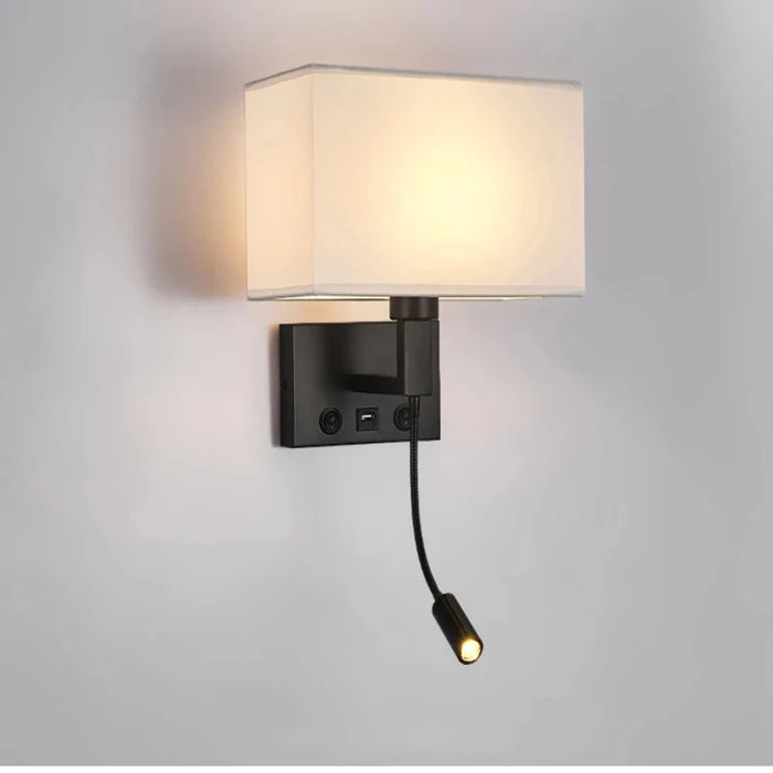 Modern bedside wall lamp with USB port and spotlight, featuring a sleek design and warm light for bedroom elegance and functionality.