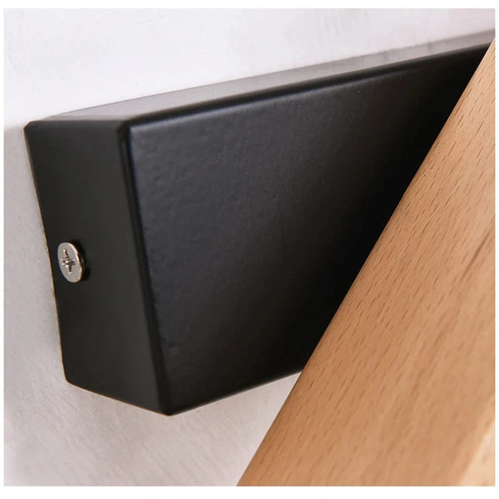 Close-up of 360° Rotatable LED Wall Lamp in sleek black and wood design.