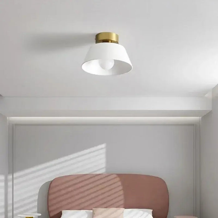 Retro iron ceiling light with LED bulb in a modern bedroom setting