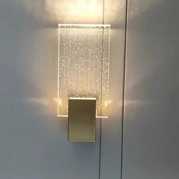 Creative Nordic Glass LED Wall Light with bubble-textured glass shade illuminating a modern interior wall.