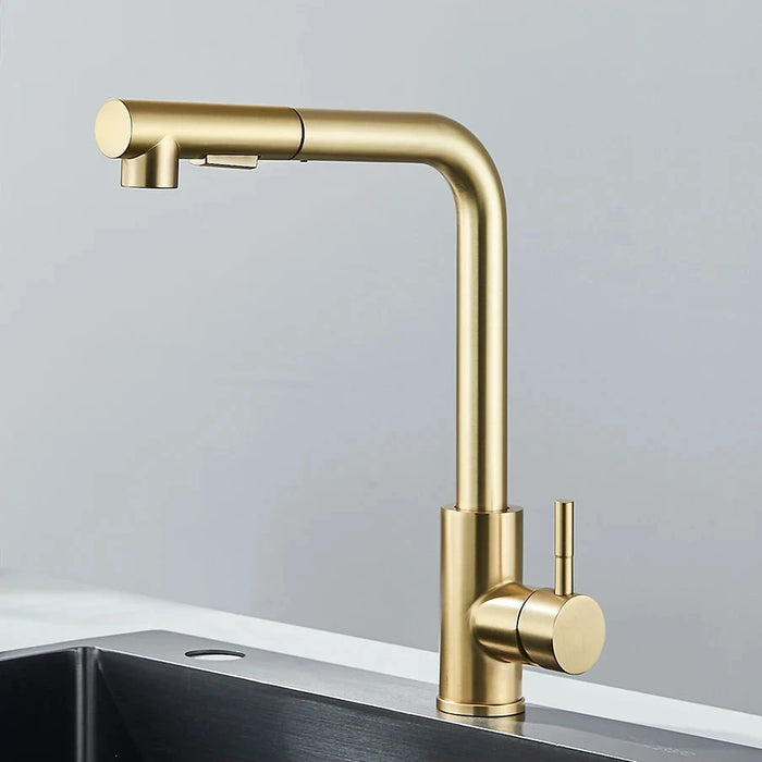 Gold kitchen sink faucet with sleek pull-out design and modern features.