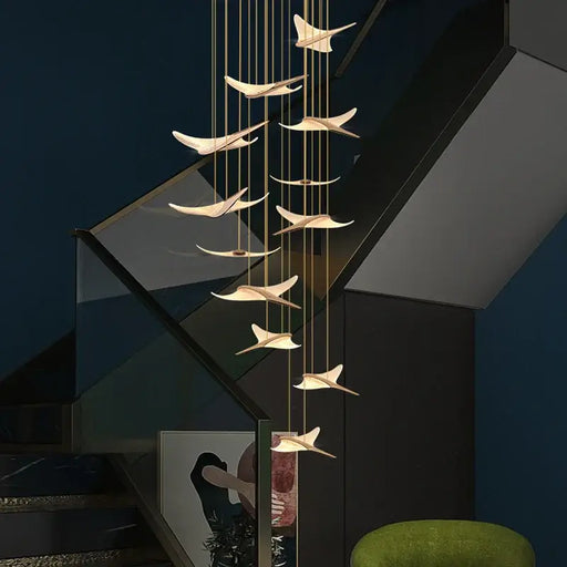 Modern LED Seagull Chandelier with adjustable suspension, ideal for high ceilings in living rooms and dining areas.