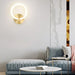 Modern Nordic LED Ring Wall Lamp illuminating a contemporary living room with stylish decor.