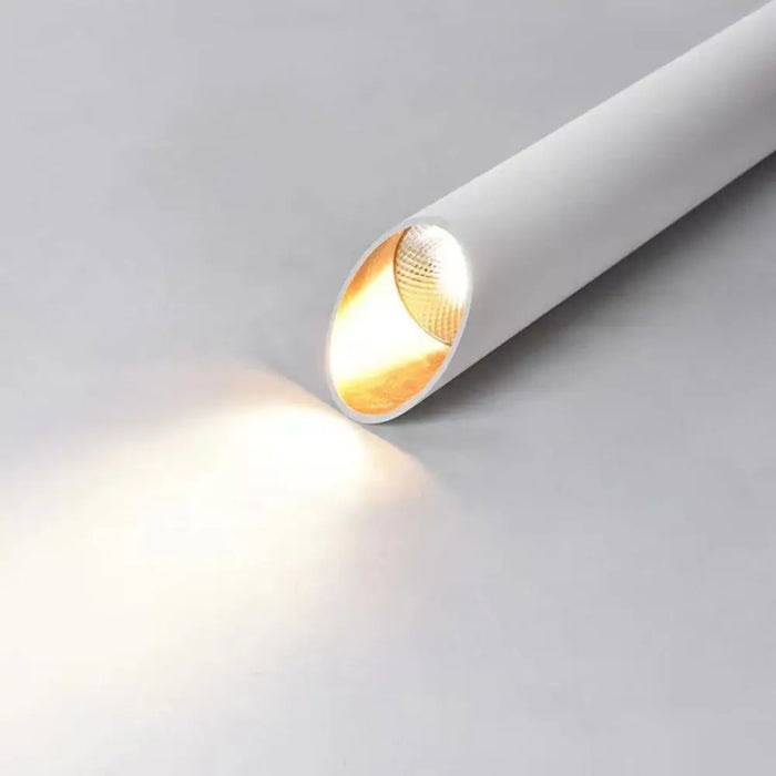 modern LED surface tube ceiling light in white illuminating a surface